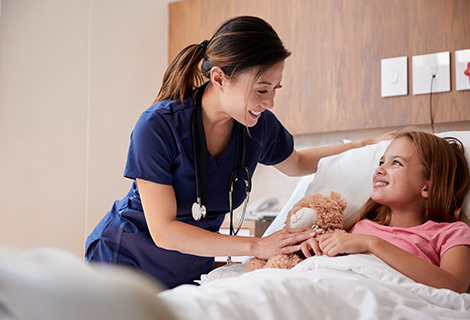 Pediatric nurse with patient